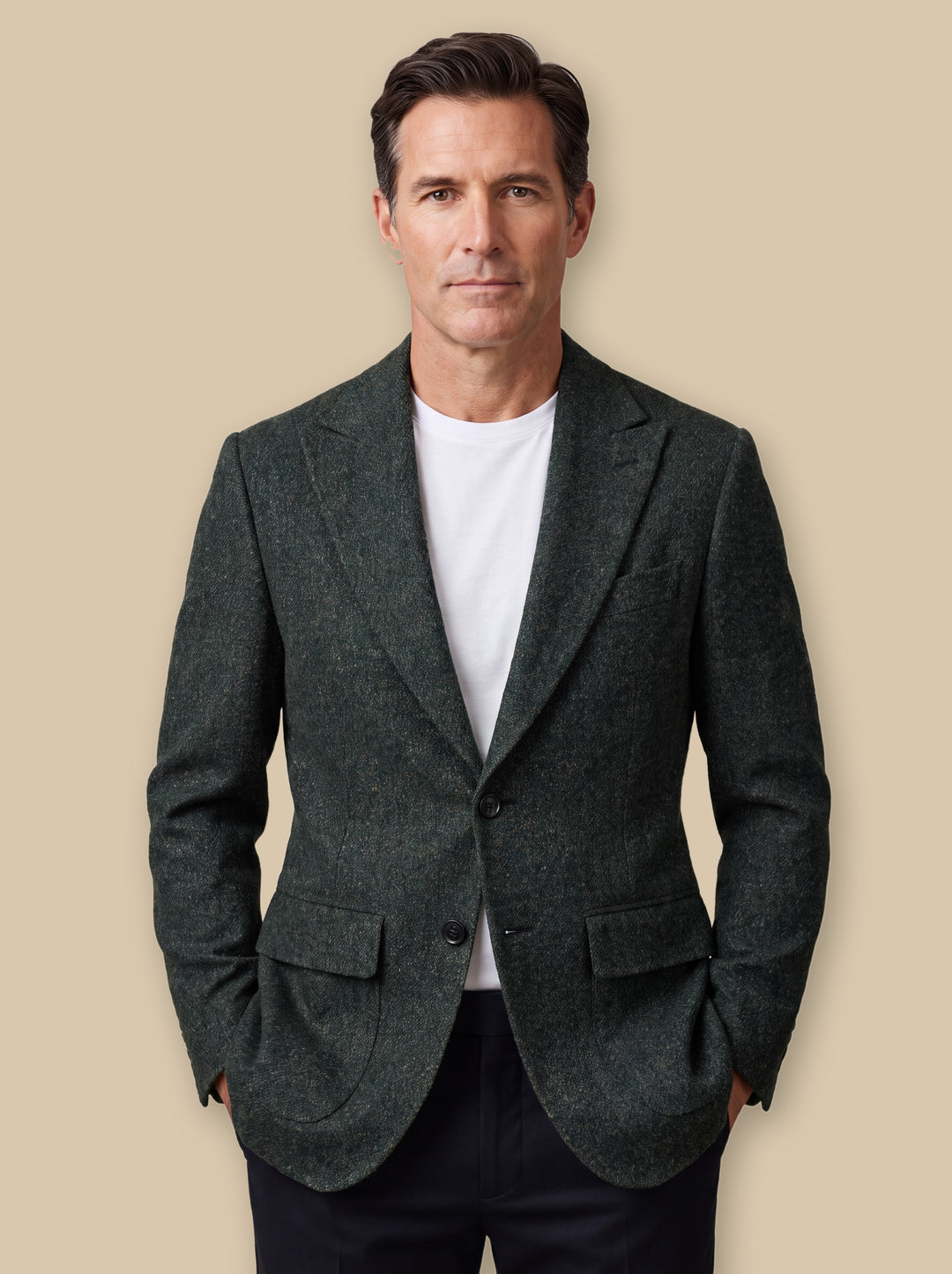 Mercer blazer suit in Green, worn by a model on a warm sand studio background - Gentlemens Manor