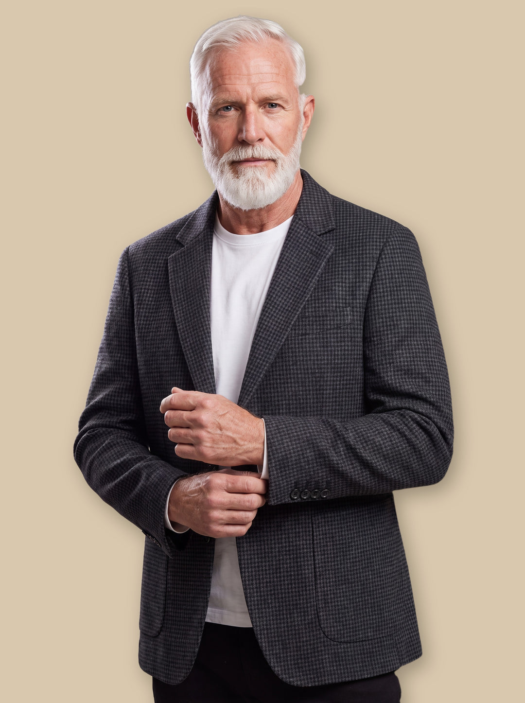 Monroe blazer suit in Grey, worn by a model on a warm sand studio background - Gentlemens Manor