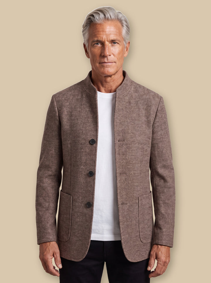 Morgan blazer suit in Brown, worn by a model on a warm sand studio background - Gentlemens Manor