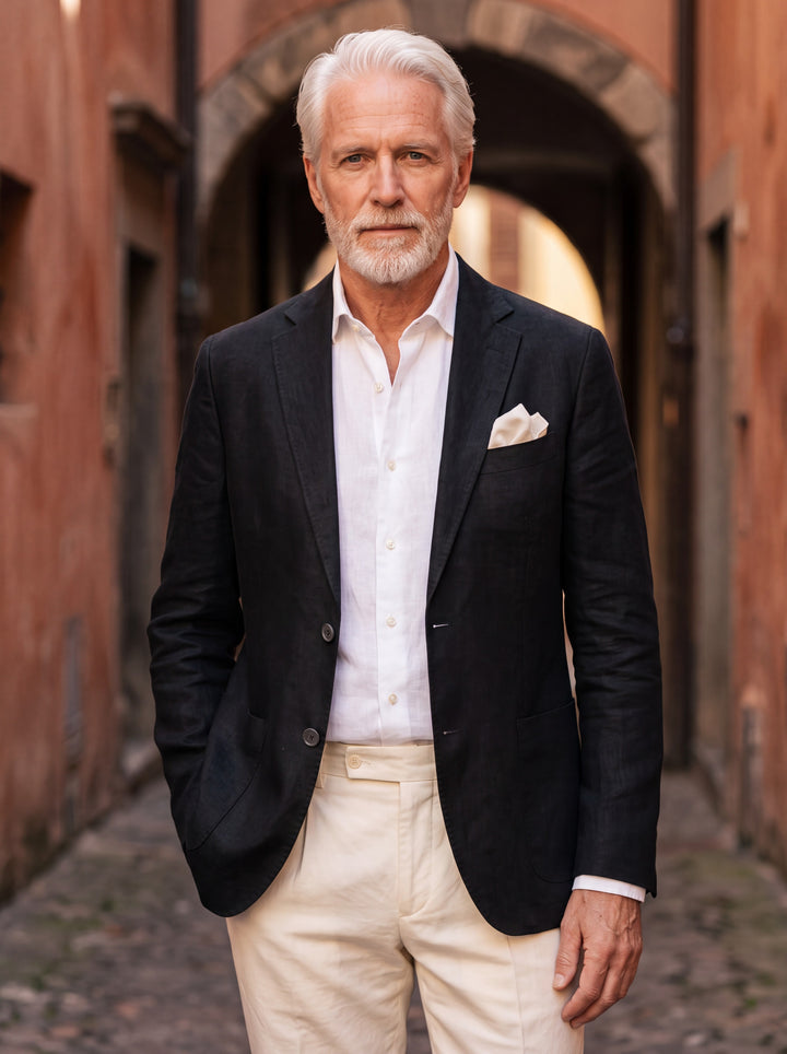 Mortimer blazer in Black, worn by a model in a Mediterranean setting - Gentlemens Manor lifestyle