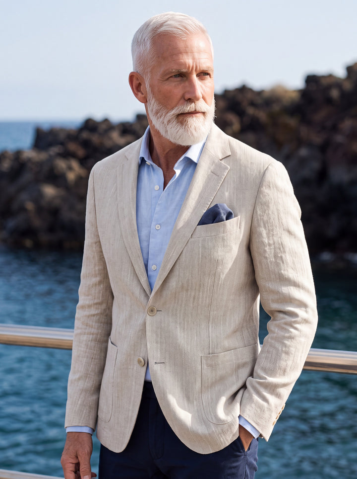 Mortimer blazer in Sand, worn by a model in a Mediterranean setting - Gentlemens Manor lifestyle