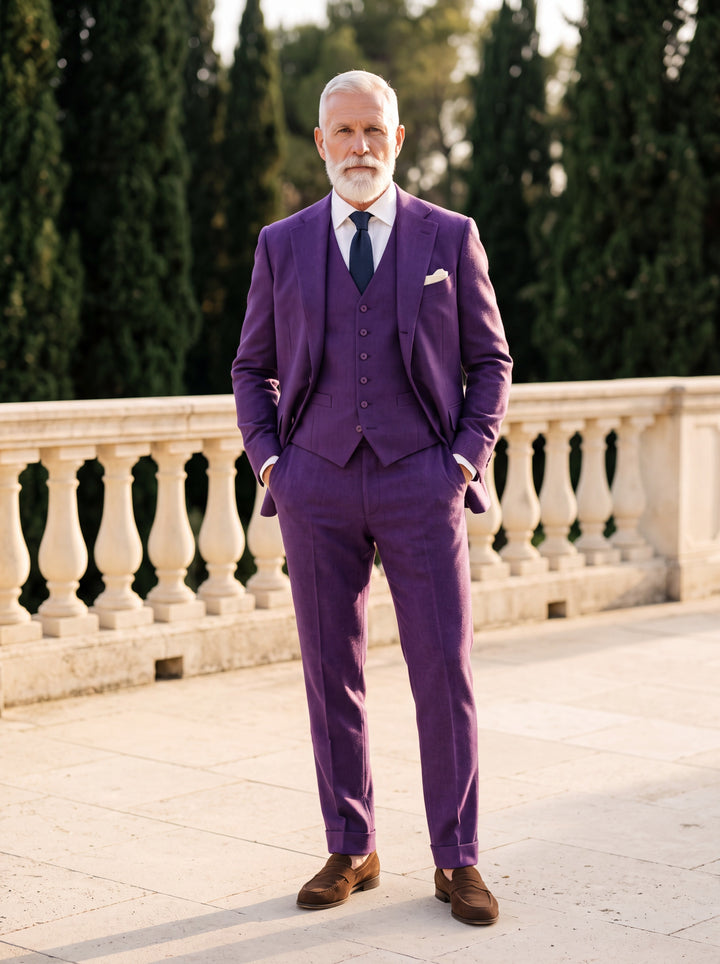 Morton Men three-piece suit in purple, worn by a model in a Mediterranean setting - Gentlemens Manor lifestyle