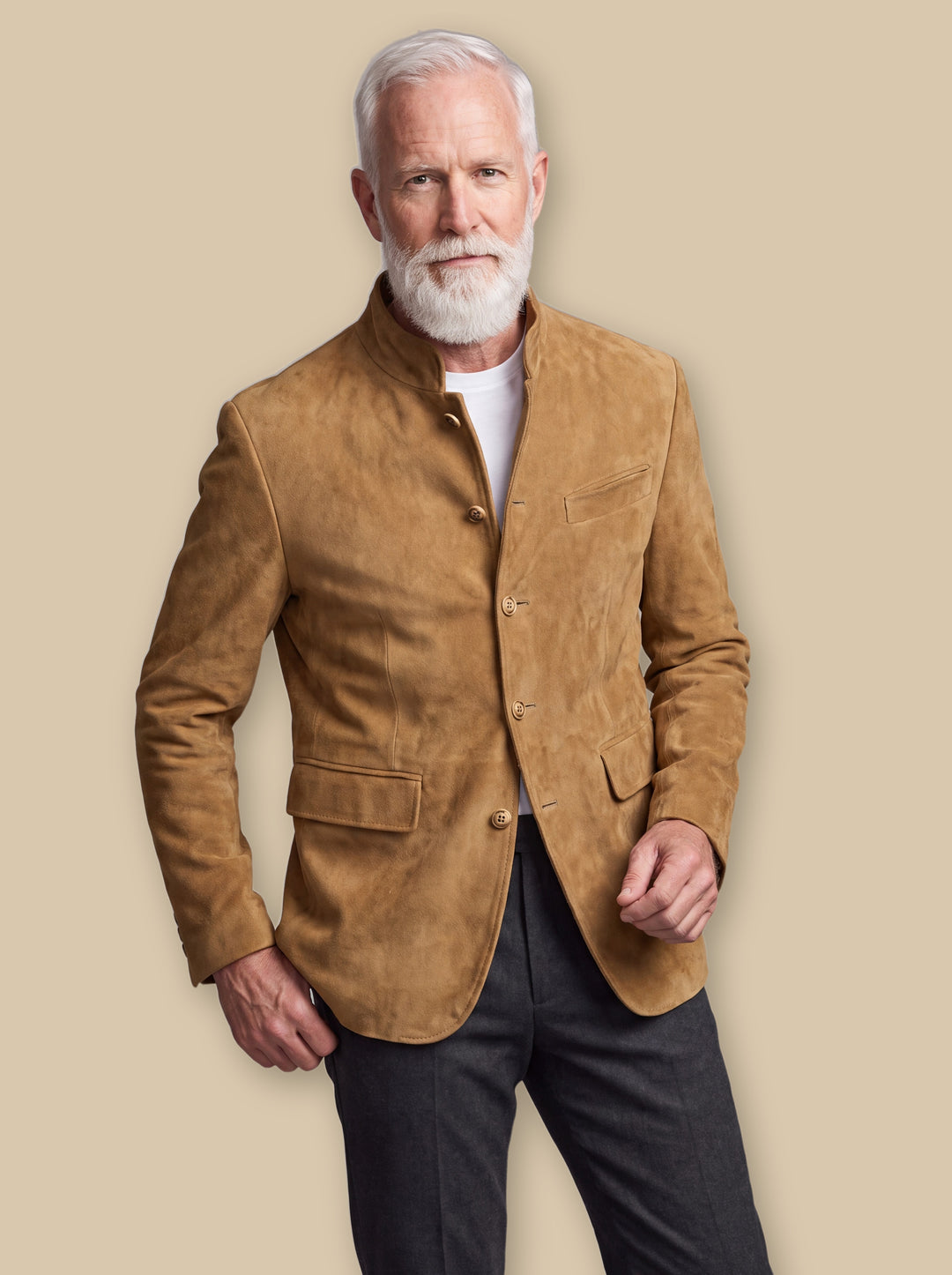 Morton jacket in Sand, worn by a model on a warm sand studio background - Gentlemens Manor