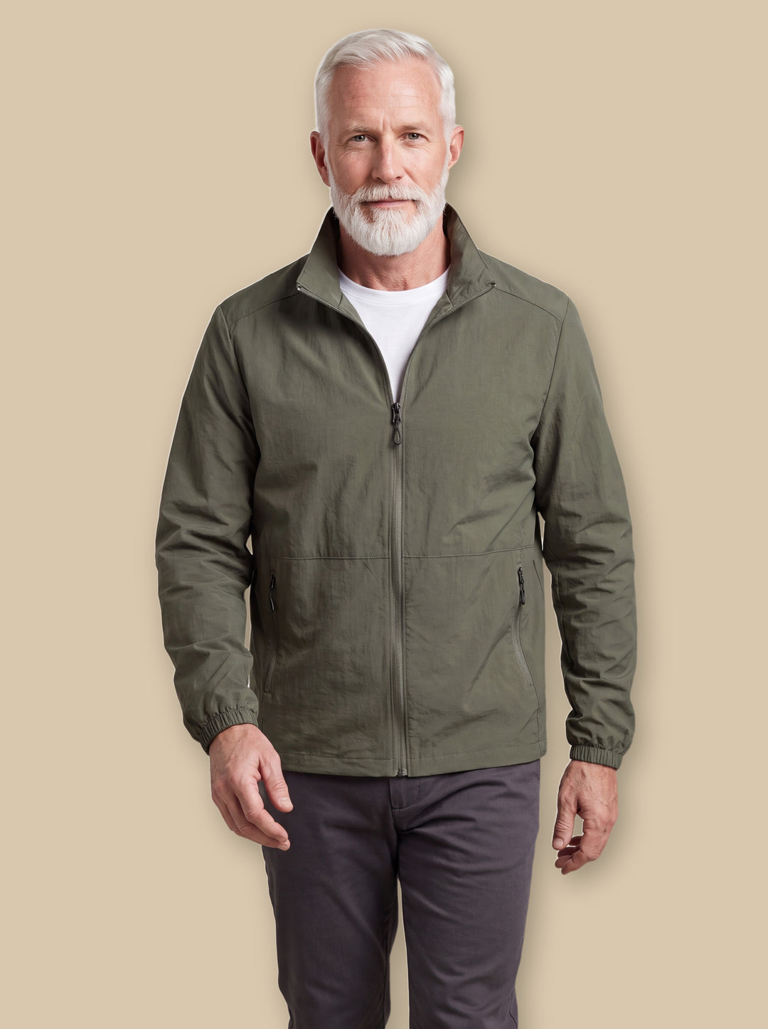 Moses jacket in Green, worn by a model on a warm sand studio background - Gentlemens Manor