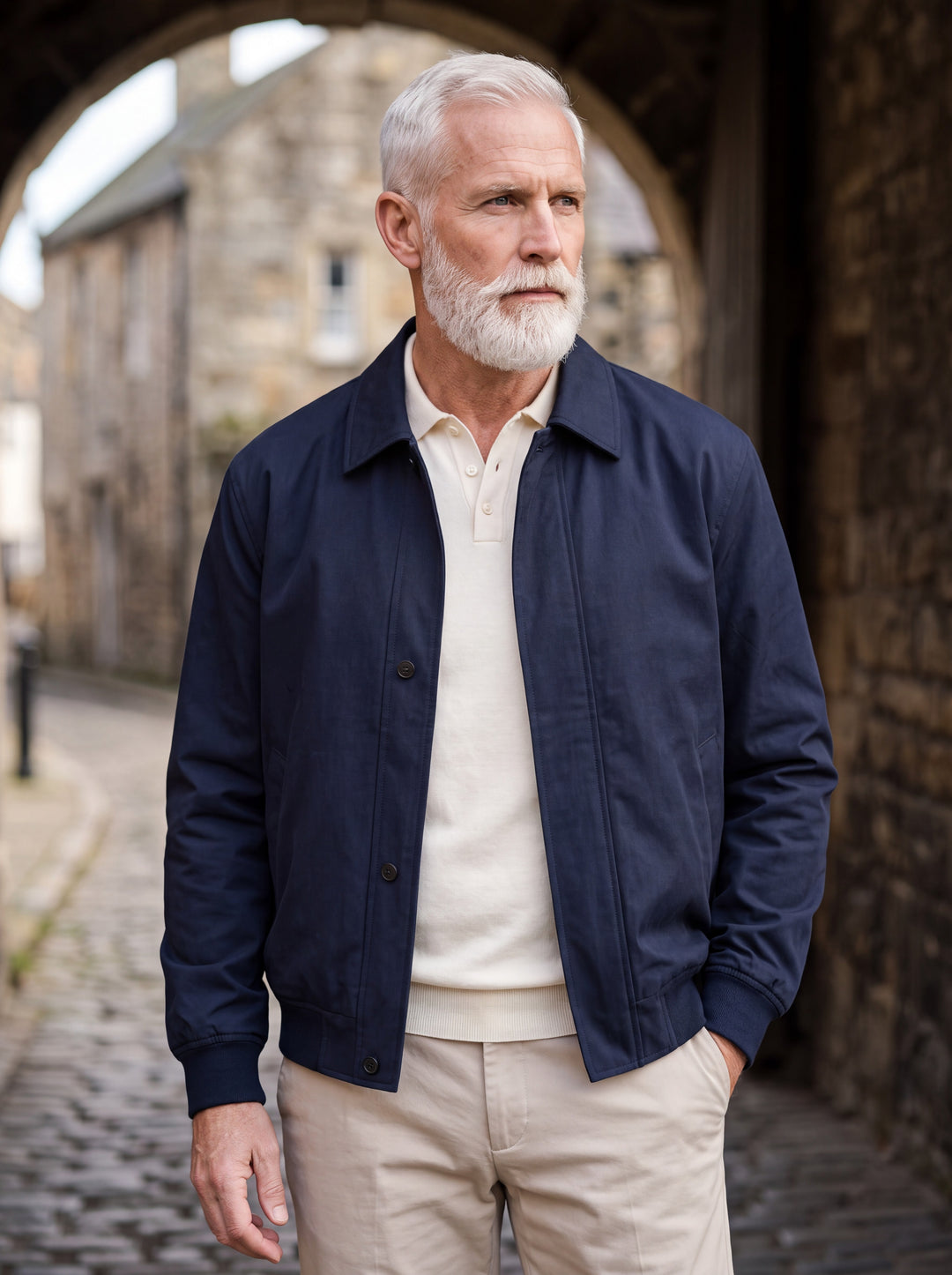Myron jacket in Navy, worn by a model in a Mediterranean setting - Gentlemens Manor lifestyle