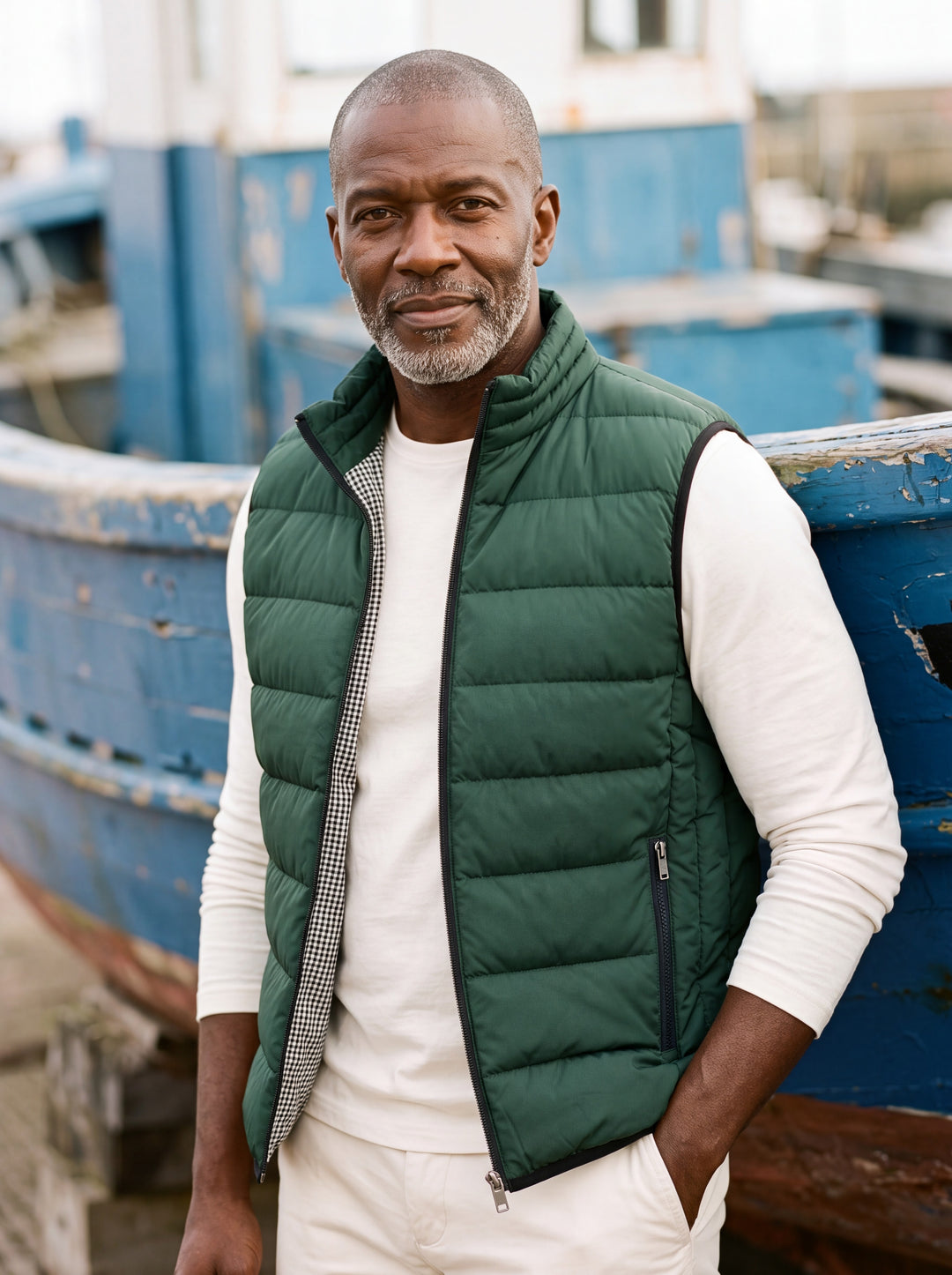 Nathaniel vest in Green, worn by a model in a Mediterranean setting - Gentlemens Manor lifestyle