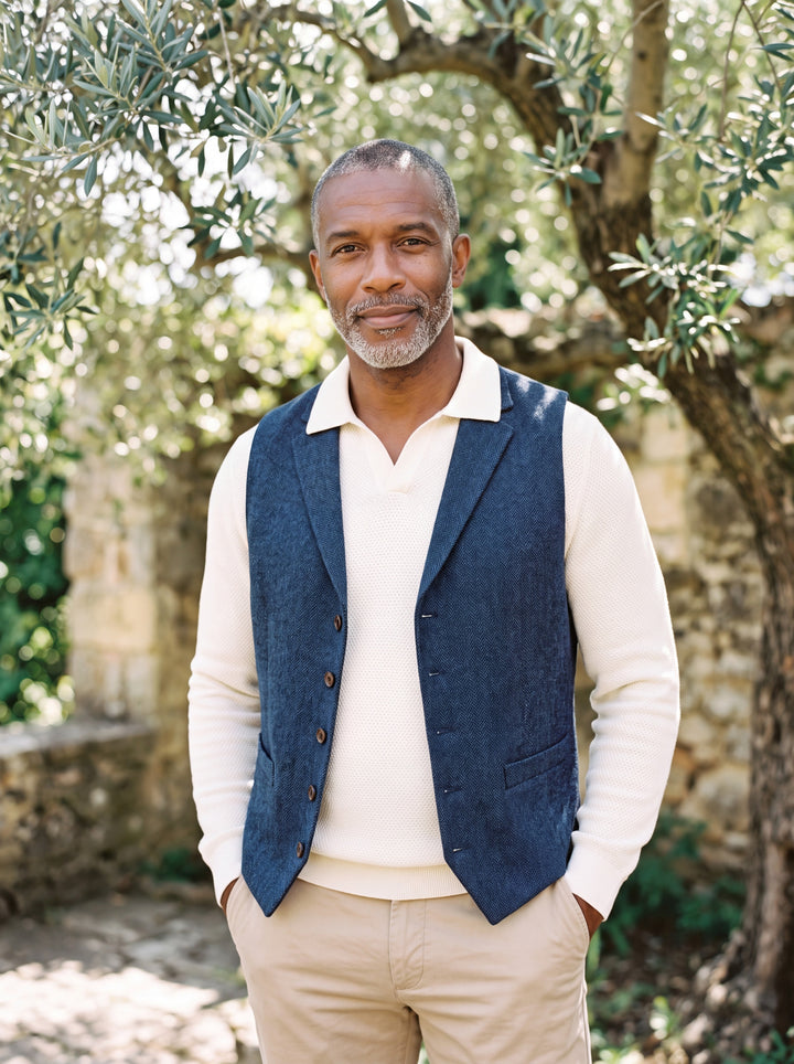 Nelson vest in Navy, worn by a model in a Mediterranean setting - Gentlemens Manor lifestyle