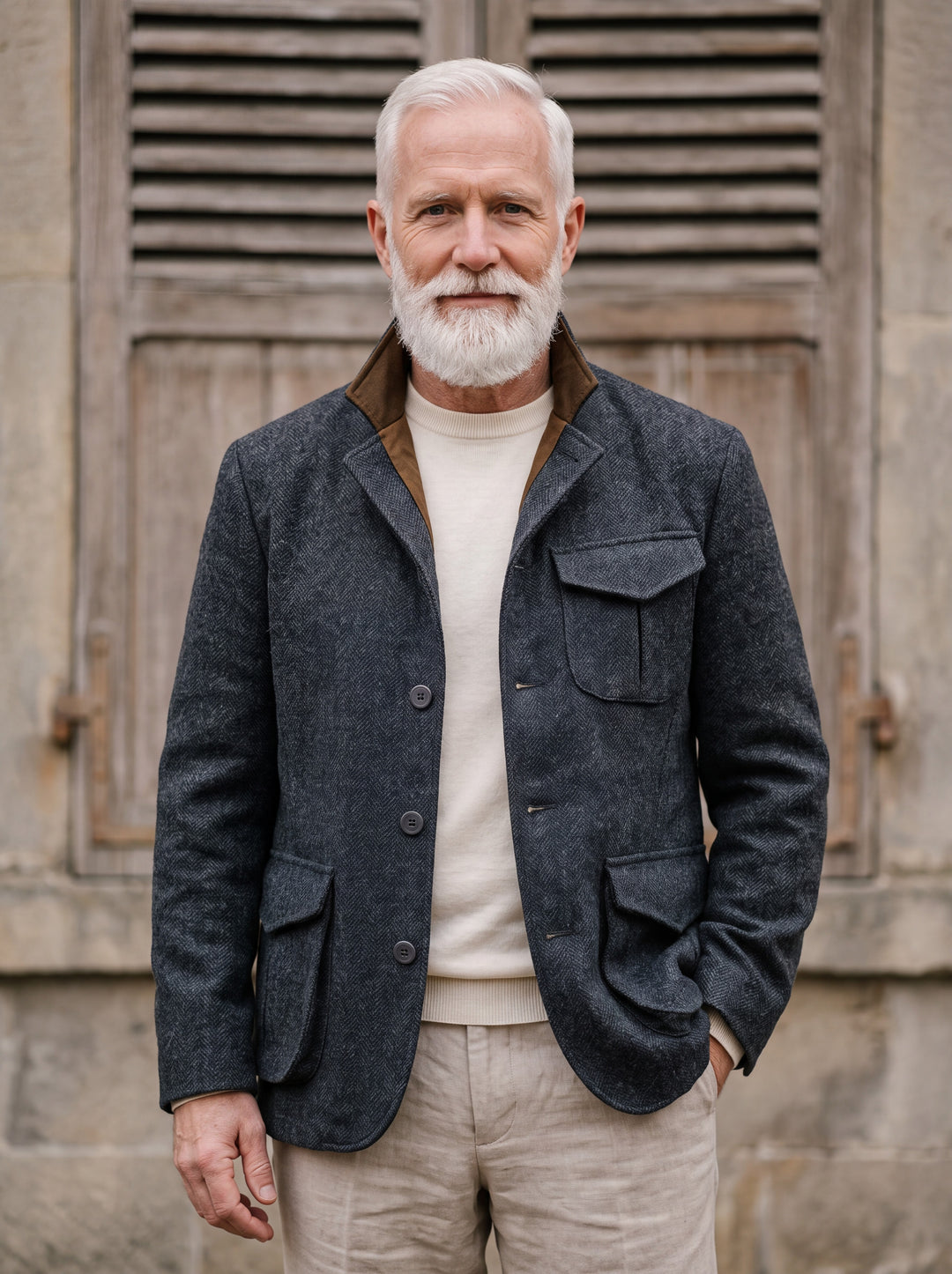 Newton jacket in Charcoal, worn by a model in a Mediterranean setting - Gentlemens Manor lifestyle
