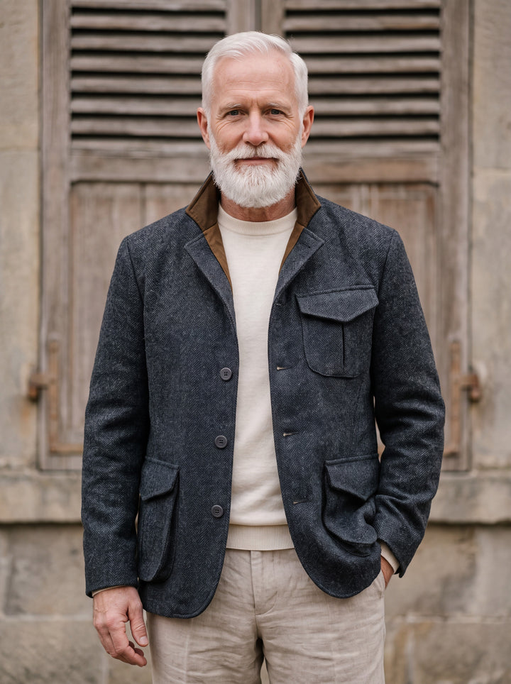 Newton jacket in Charcoal, worn by a model in a Mediterranean setting - Gentlemens Manor lifestyle