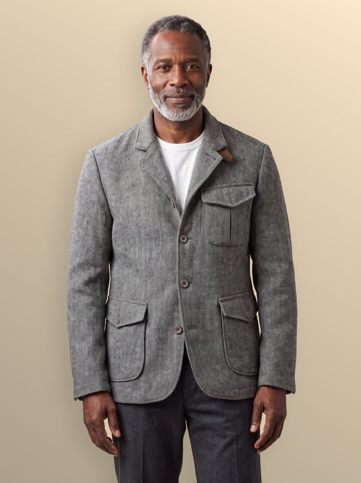 Newton jacket in Light Grey, worn by a model on a soft blue studio background - Gentlemens Manor