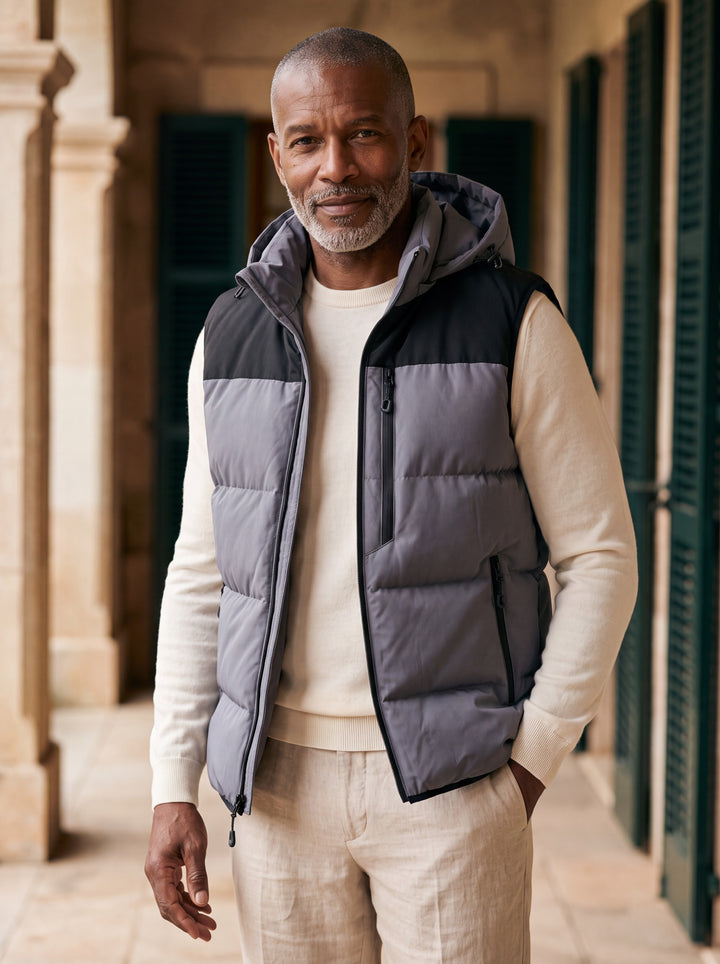 Noah vest in Grey, worn by a model in a Mediterranean setting - Gentlemens Manor lifestyle