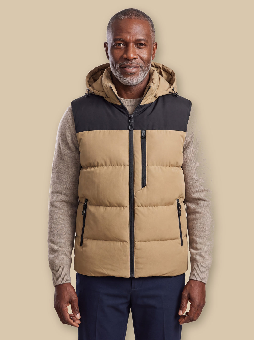 Noah vest in Sand, worn by a model on a warm sand studio background - Gentlemens Manor