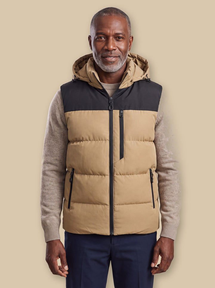 Noah vest in Sand, worn by a model on a warm sand studio background - Gentlemens Manor
