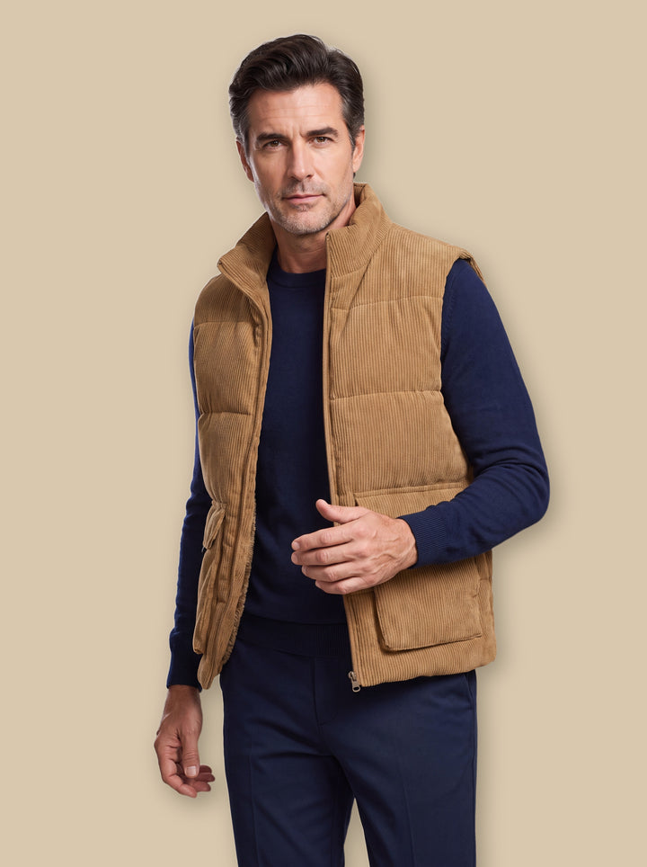Nolan vest in Camel, worn by a model on a warm sand studio background - Gentlemens Manor