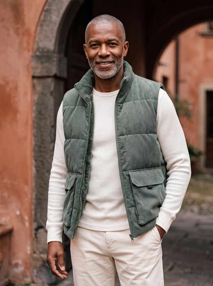 Nolan vest in Green, worn by a model in a Mediterranean setting - Gentlemens Manor lifestyle