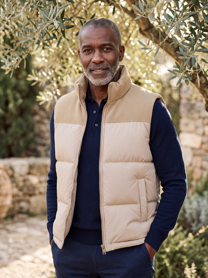 Norbert vest in Cream, worn by a model in a Mediterranean setting - Gentlemens Manor lifestyle