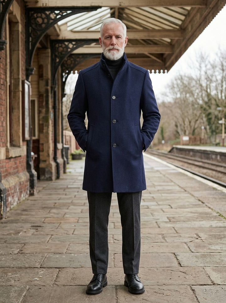 Norcross overcoat in Navy, lifestyle on a railway platform, Gentlemens Manor