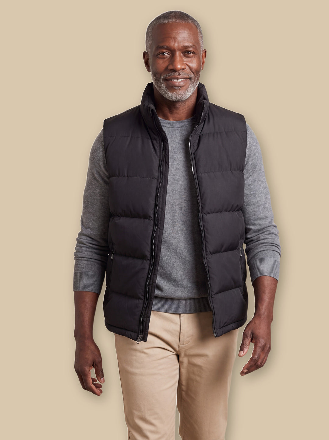 Odell vest in Black, worn by a model on a warm sand studio background - Gentlemens Manor