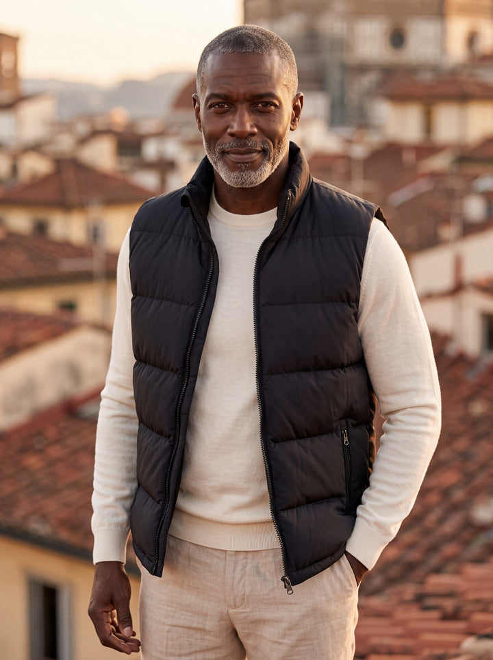 Odell vest in Black, worn by a model in a Mediterranean setting - Gentlemens Manor lifestyle