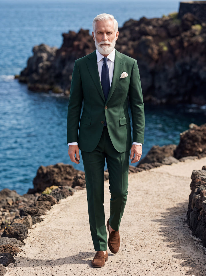 Ogden Men two-piece suit in Green, worn by a model in a Mediterranean setting - Gentlemens Manor lifestyle