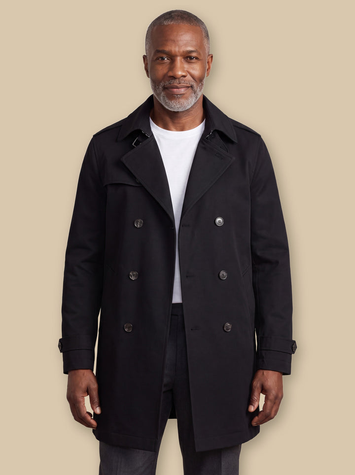 Oran jacket in Black, worn by a model on a warm sand studio background - Gentlemens Manor