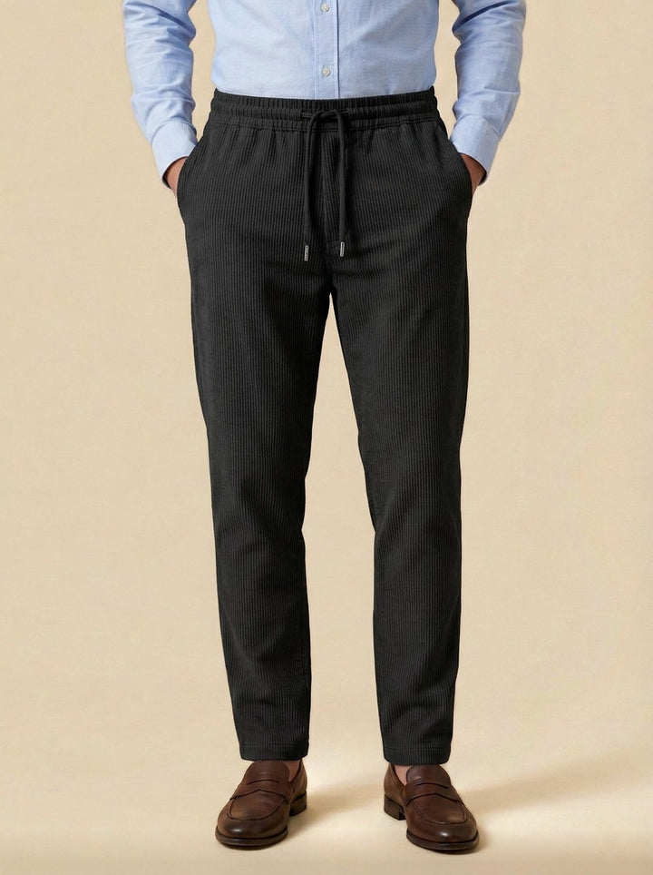 Ormsby corduroy drawstring tapered pants in Black, studio, Gentlemens Manor
