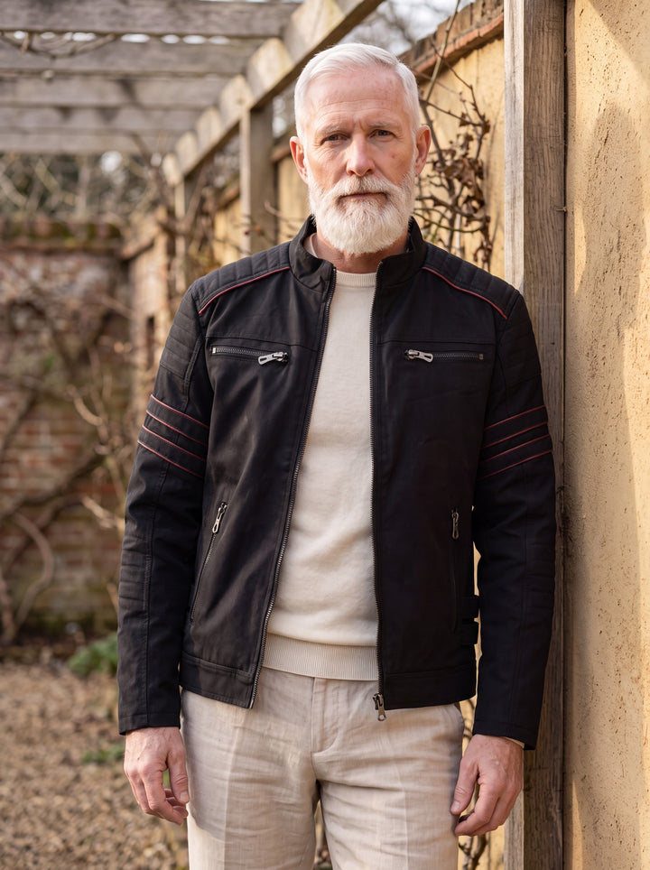 Orson jacket in Black, worn by a model in a Mediterranean setting - Gentlemens Manor lifestyle