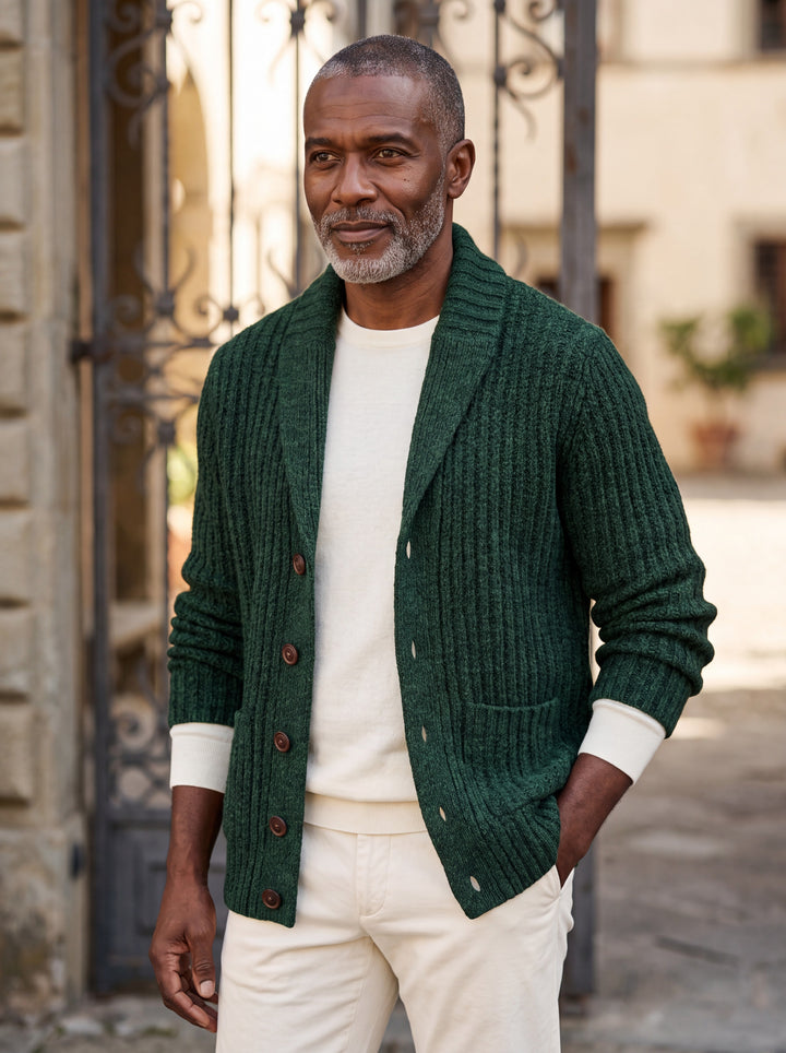 Oscar cardigan in Green, worn by a model in a Mediterranean setting - Gentlemens Manor lifestyle