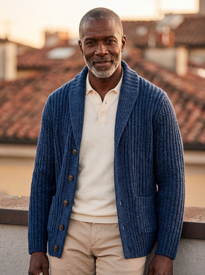 Oscar cardigan in Navy, worn by a model in a Mediterranean setting - Gentlemens Manor lifestyle