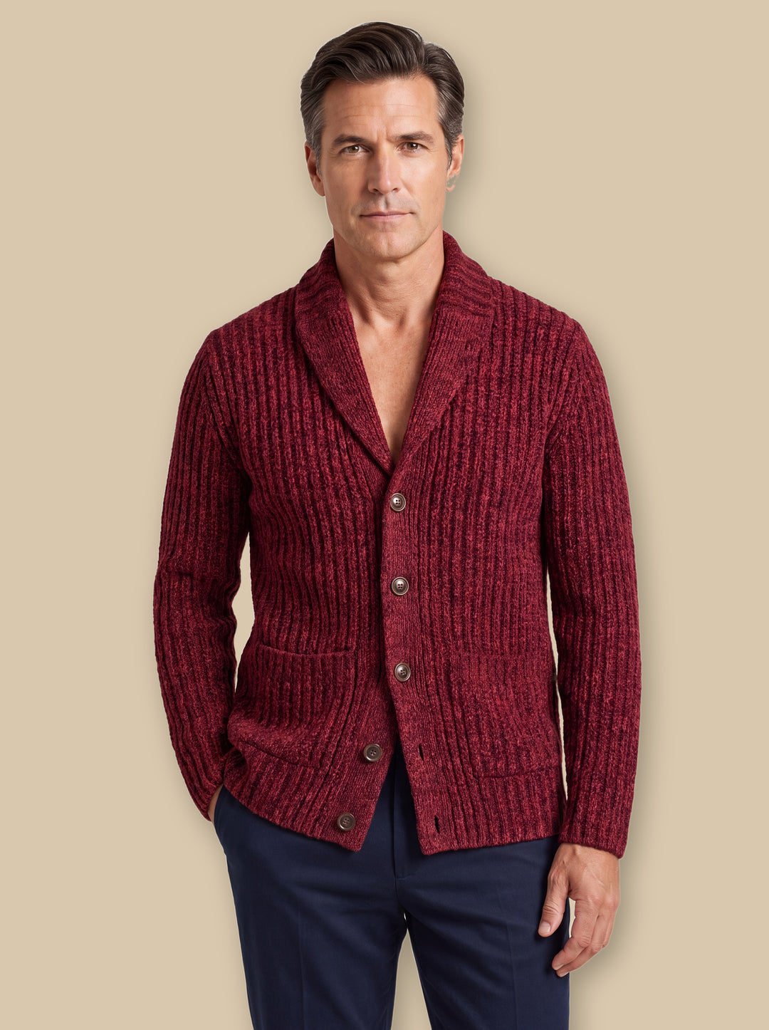 Oscar knit sweater in Burgundy, worn by a model on a warm sand studio background - Gentlemens Manor
