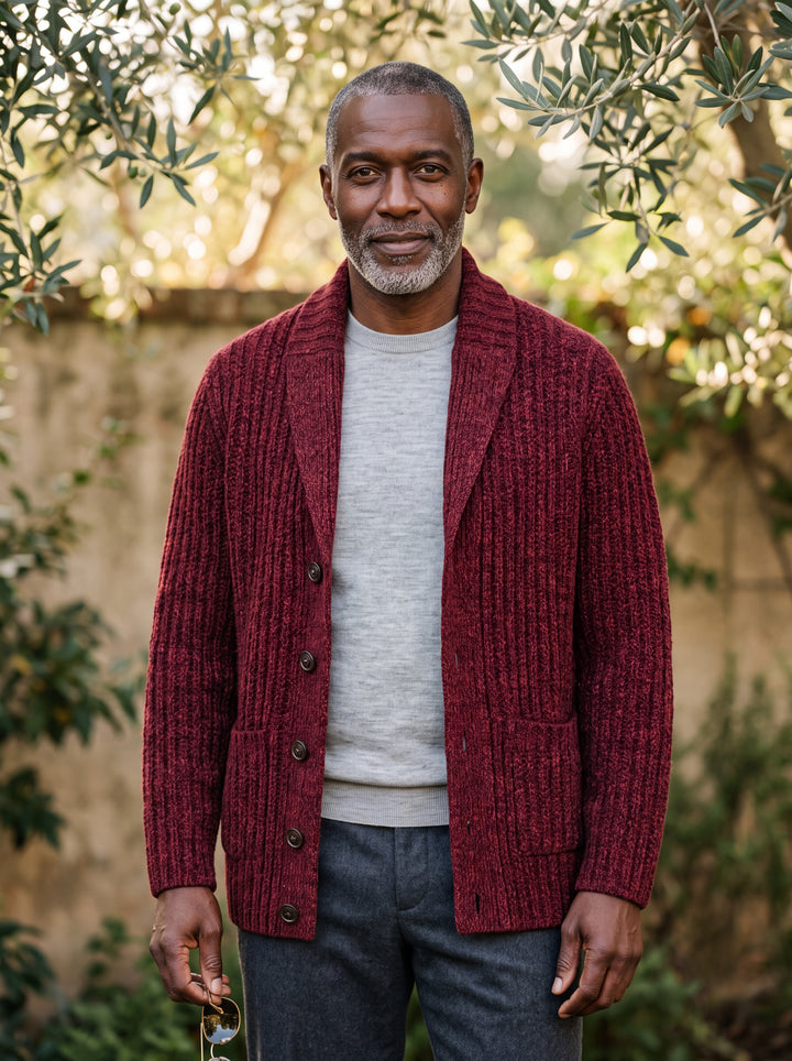 Oscar cardigan in Burgundy, worn by a model in a Mediterranean setting - Gentlemens Manor lifestyle