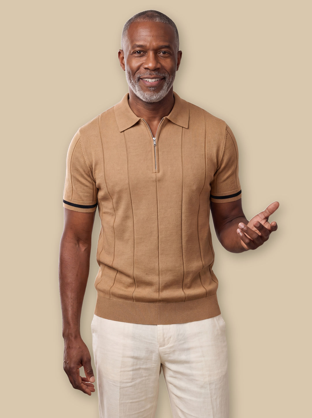 Osmond polo shirt in Brown, worn by a model on a warm sand studio background - Gentlemens Manor