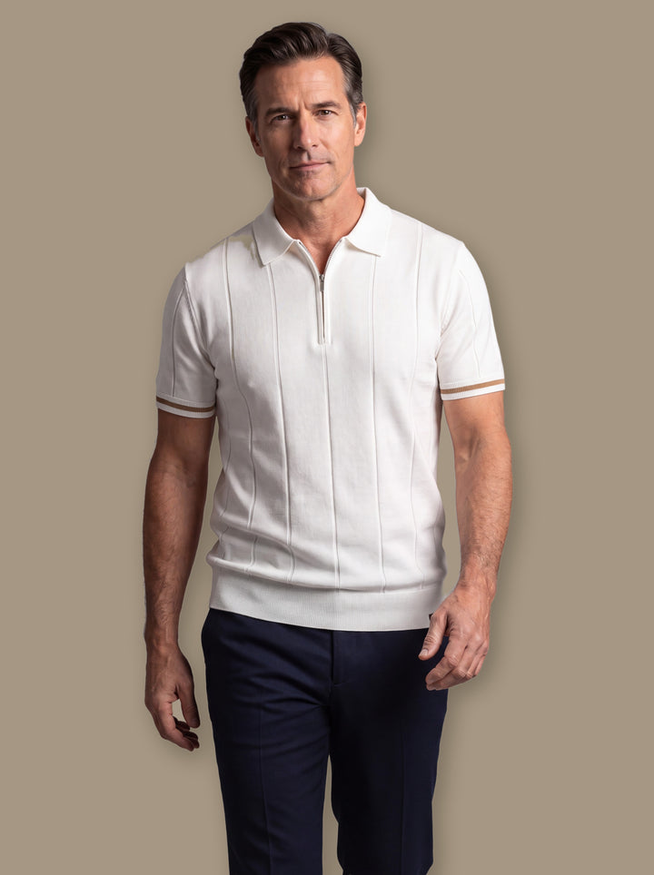 Otis polo shirt in White, worn by a model on a warm taupe studio background - Gentlemens Manor