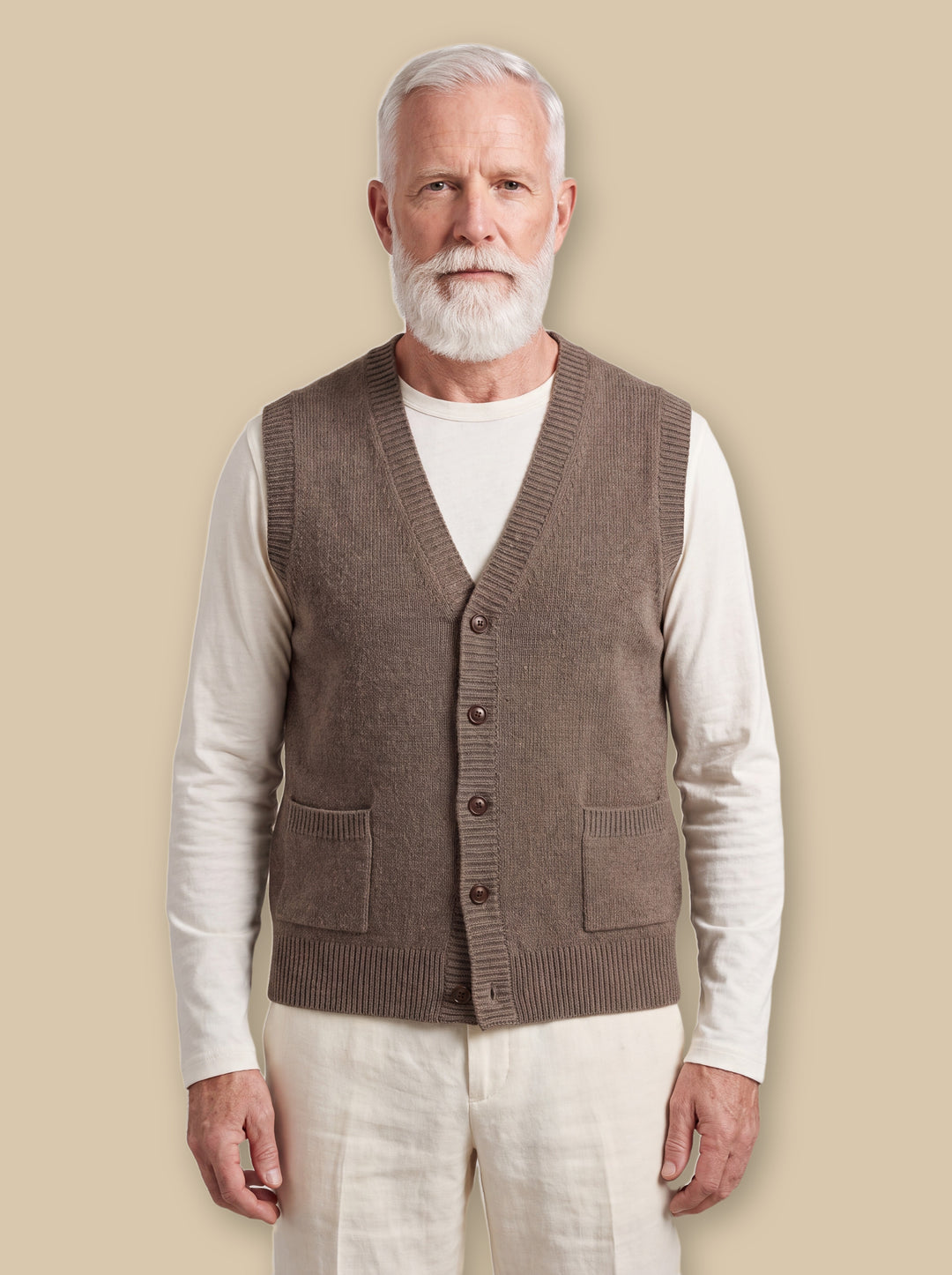 Otto knit sweater in Brown, worn by a model on a warm sand studio background - Gentlemens Manor