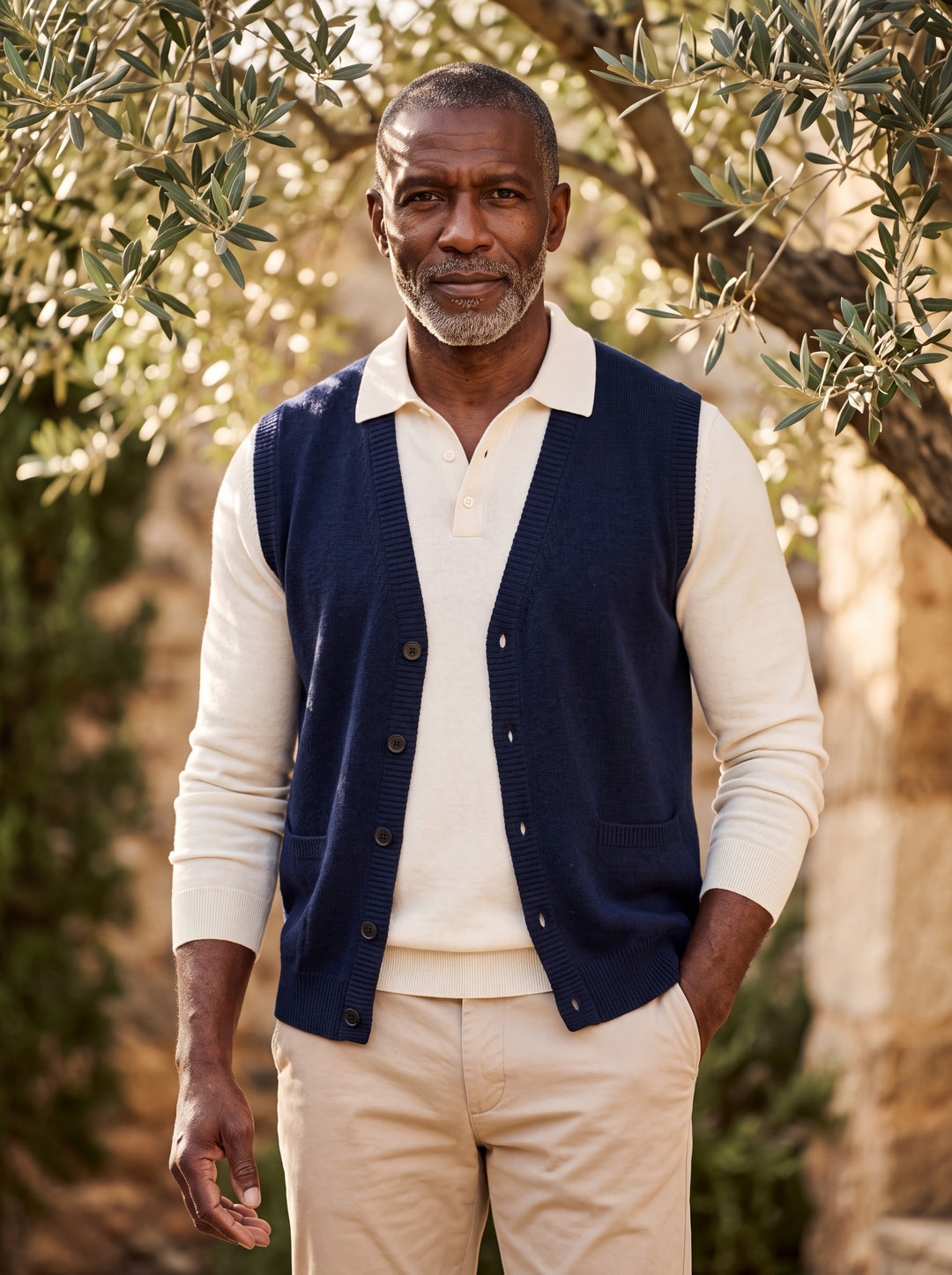 Otto vest in Navy, worn by a model in a Mediterranean setting - Gentlemens Manor lifestyle