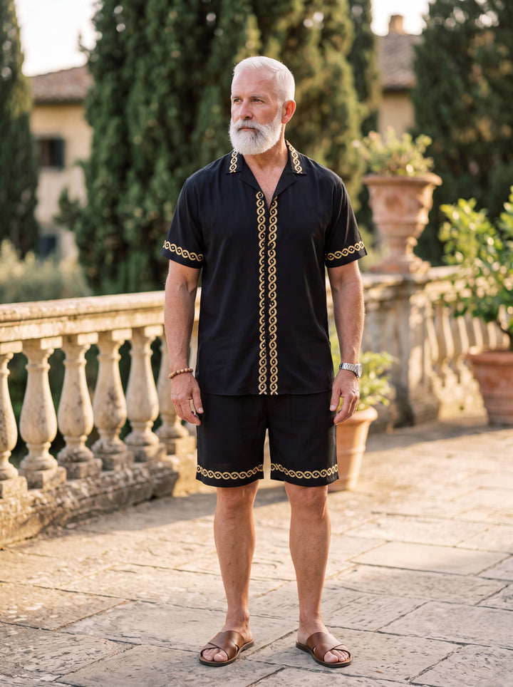 Parker Men two-piece summer set in black, worn by a model in a Mediterranean setting - Gentlemens Manor lifestyle