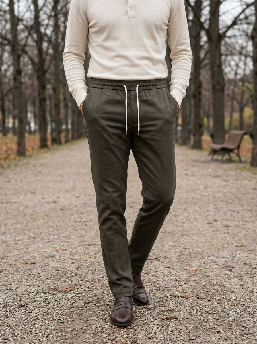 Pendleton slim twill drawstring trousers in Olive, lifestyle on a park path, Gentlemens Manor