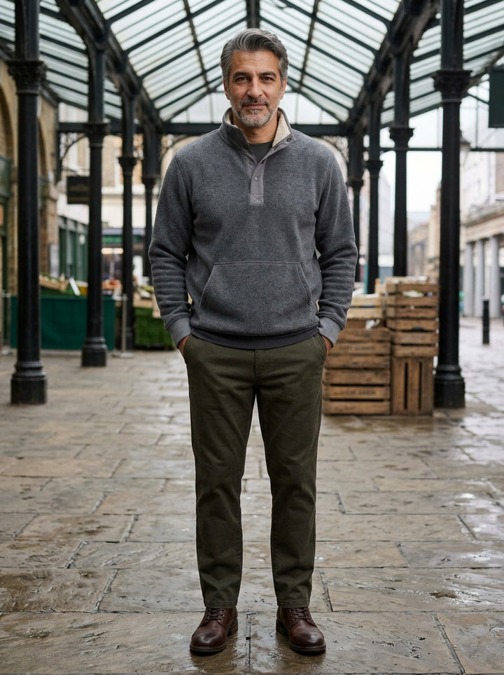 Pennington sweater in Charcoal, lifestyle in a covered market hall, Gentlemens Manor