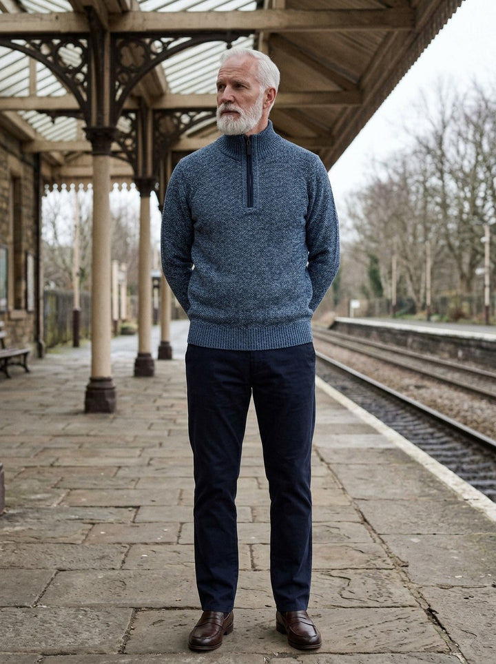 Penrose half zip sweater in Blue, lifestyle on a railway platform, Gentlemens Manor