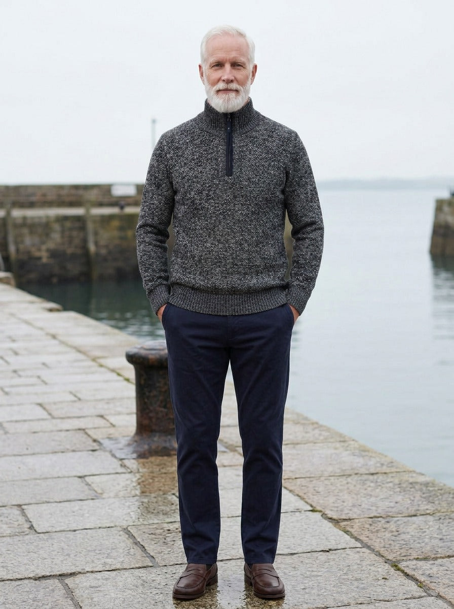 Penrose half zip sweater in Charcoal, lifestyle on a stone harbor quay, Gentlemens Manor