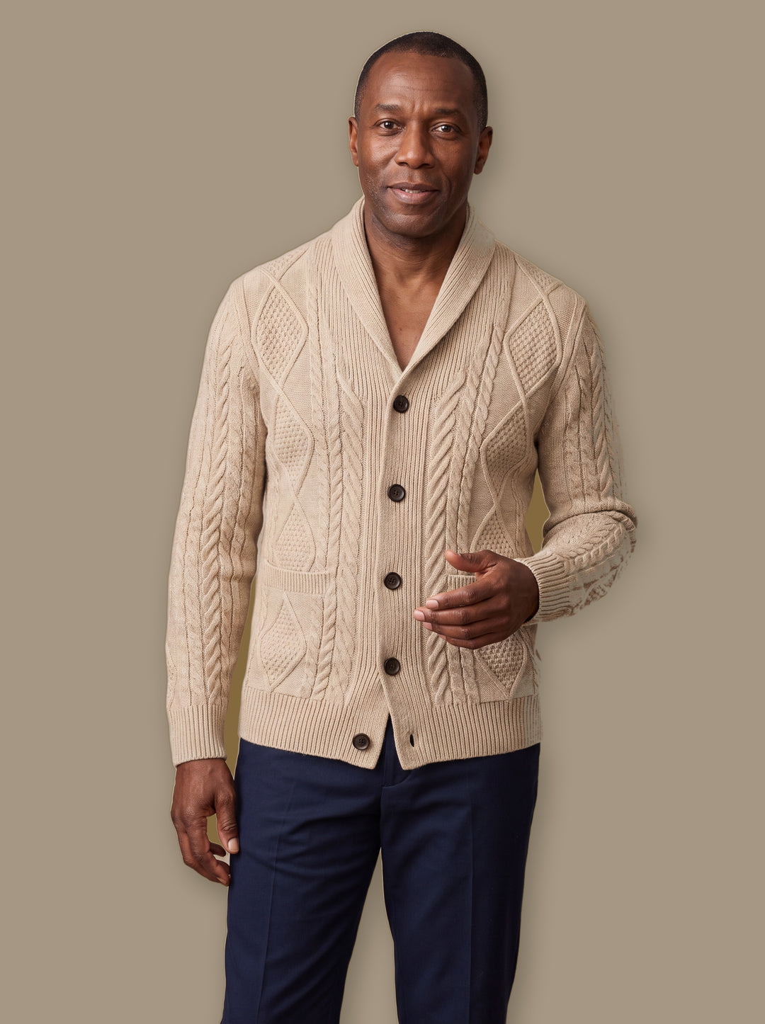 Percival knit sweater in Beige, worn by a model on a warm taupe studio background - Gentlemens Manor