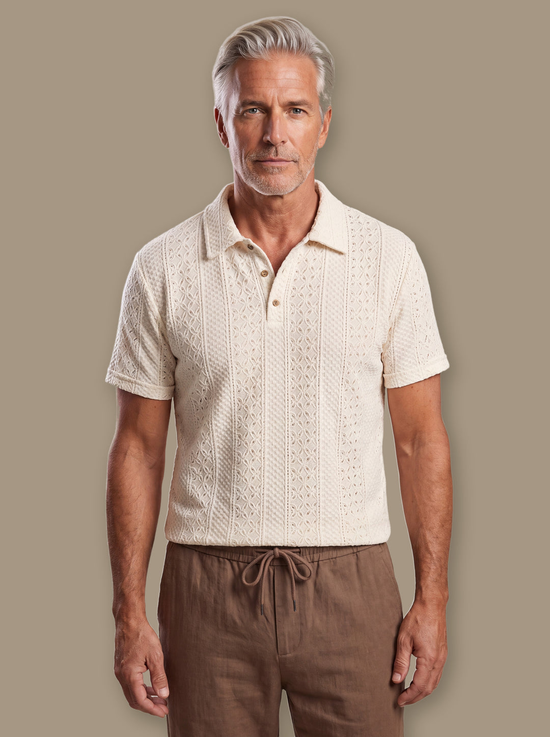 Peter polo shirt in Cream, worn by a model on a warm taupe studio background - Gentlemens Manor