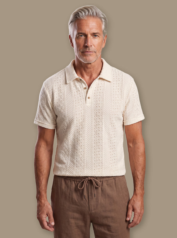Peter polo shirt in Cream, worn by a model on a warm taupe studio background - Gentlemens Manor