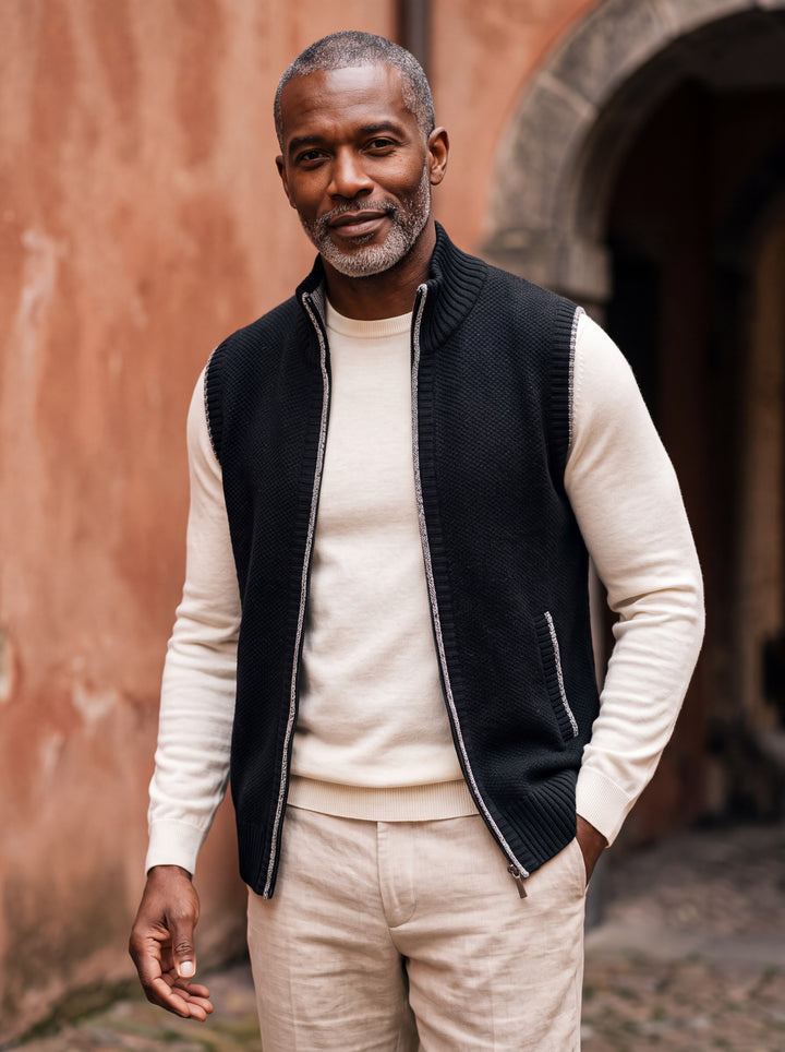 Philip vest in Black, worn by a model in a Mediterranean setting - Gentlemens Manor lifestyle