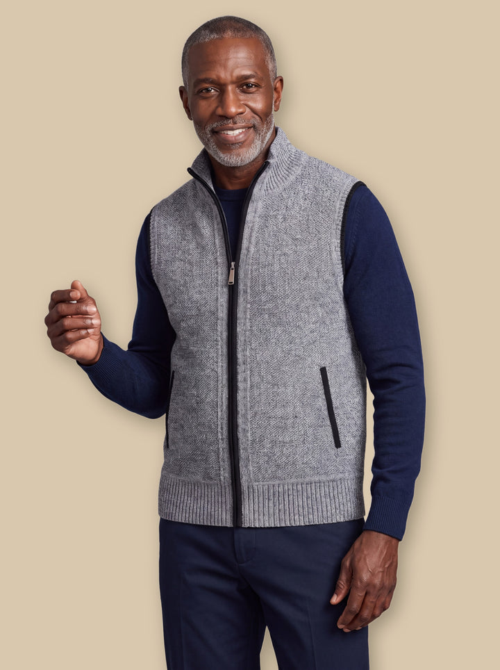 Philip knit sweater in Light Grey, worn by a model on a warm sand studio background - Gentlemens Manor