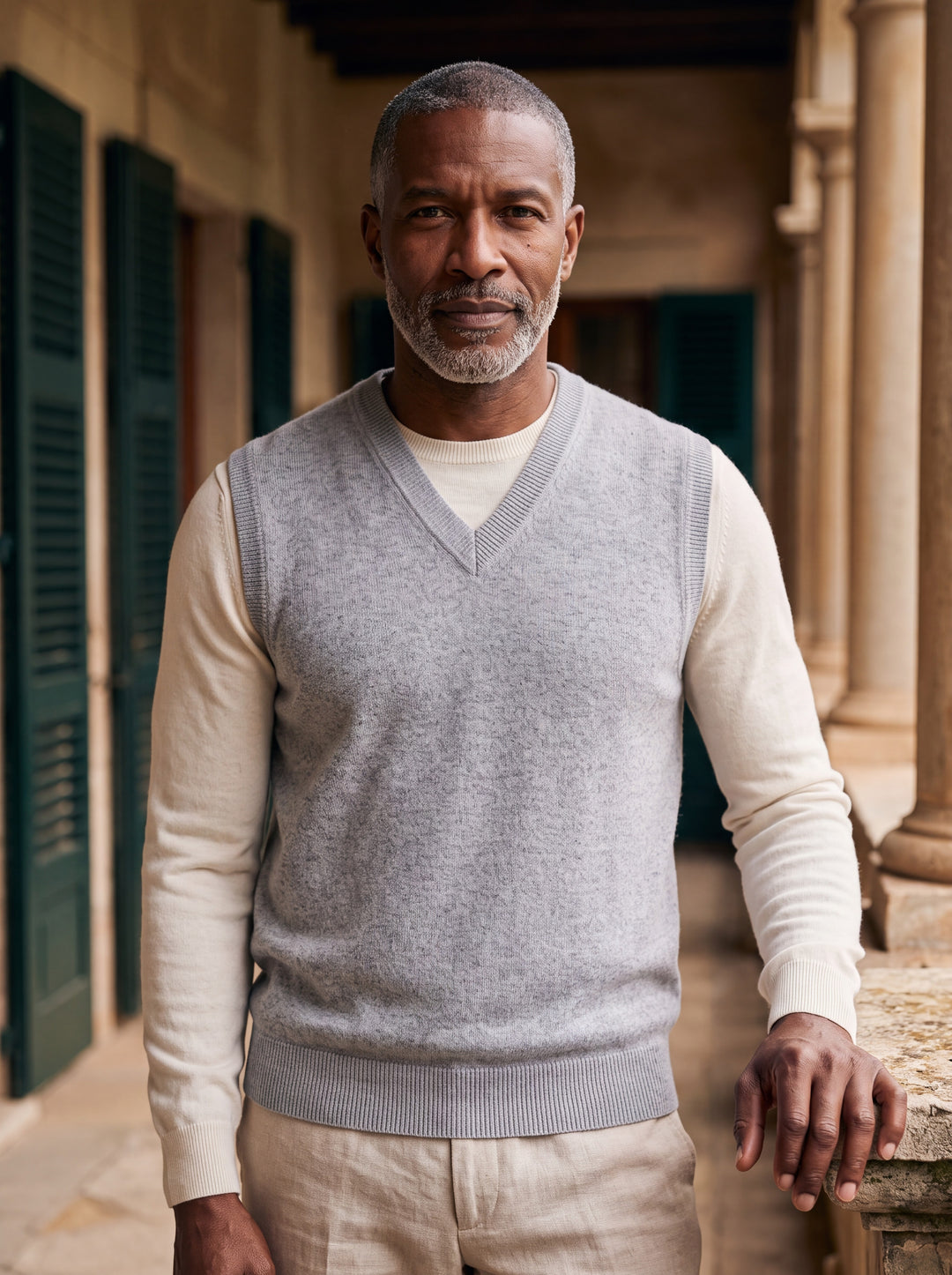Phineas vest in Grey, worn by a model in a Mediterranean setting - Gentlemens Manor lifestyle