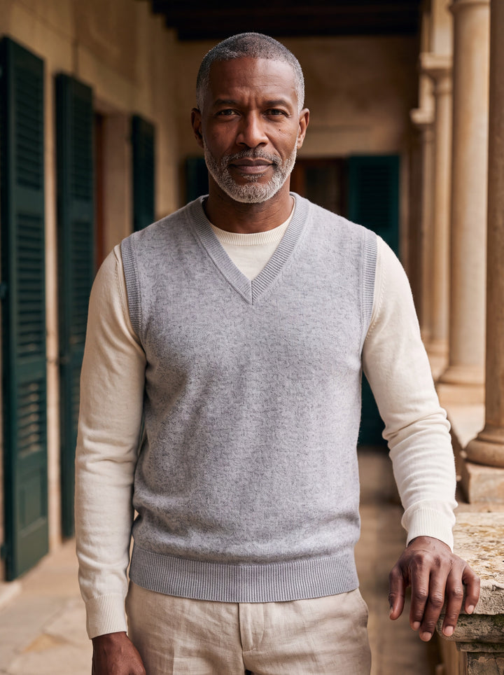 Phineas vest in Grey, worn by a model in a Mediterranean setting - Gentlemens Manor lifestyle