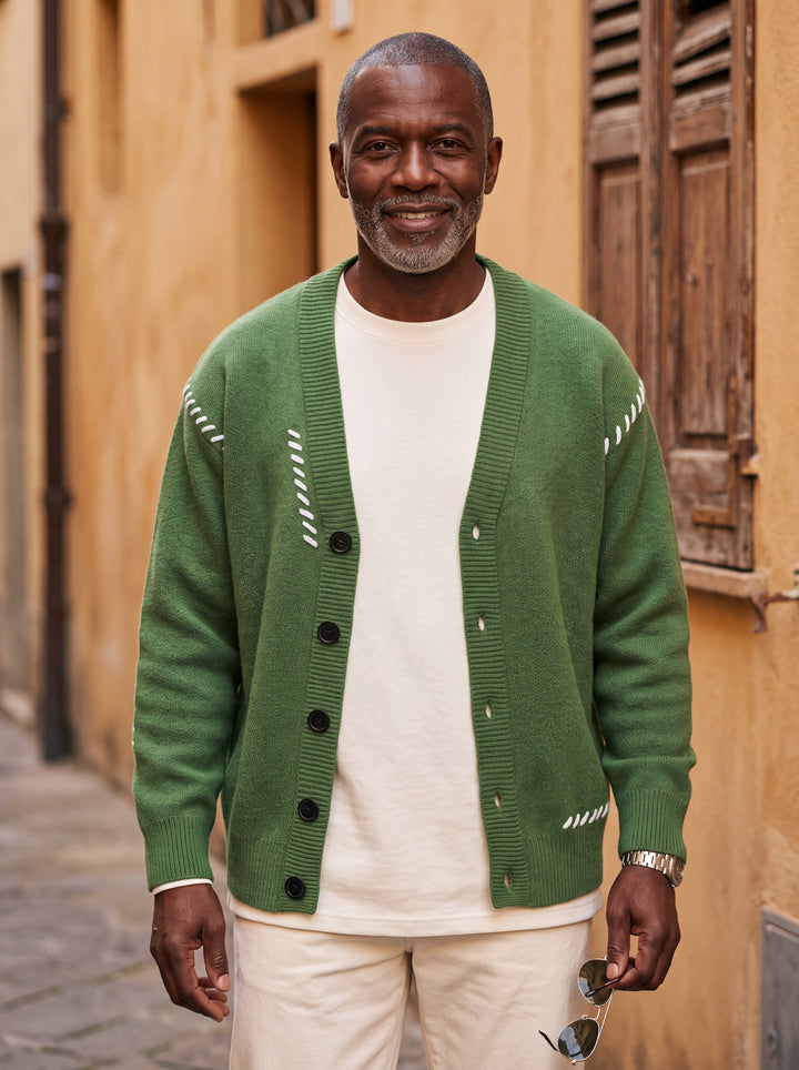 Pierce cardigan in Green, worn by a model in a Mediterranean setting - Gentlemens Manor lifestyle