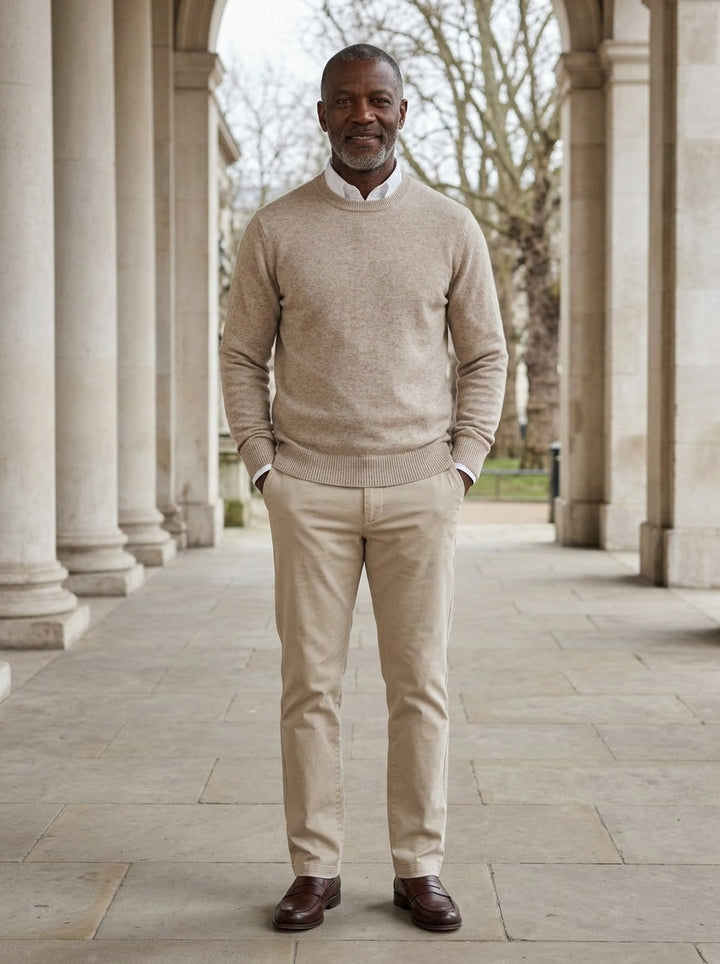 Pierson sweater in Beige, lifestyle in a stone colonnade, Gentlemens Manor