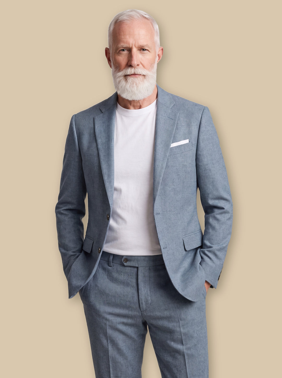 Preston blazer suit in Blue, worn by a model on a warm sand studio background - Gentlemens Manor